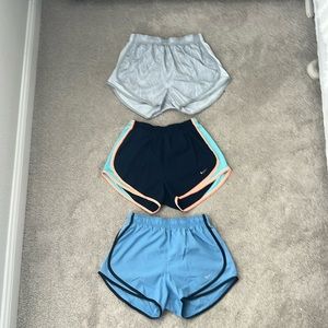 Women’s Nike Dri-Fit drawstring running shorts. Selling as set of 3.